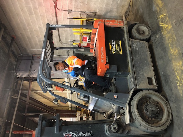 Charles Lavarias with the 5 ton forklift
