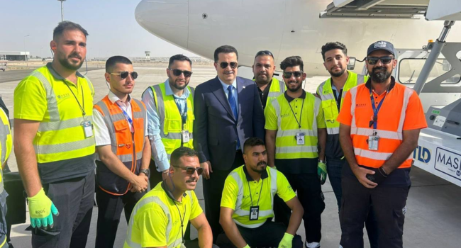 The team pose for a photo after the official reopening of Mosul Airport The team pose for a photo after the official reopening of Mosul Airport