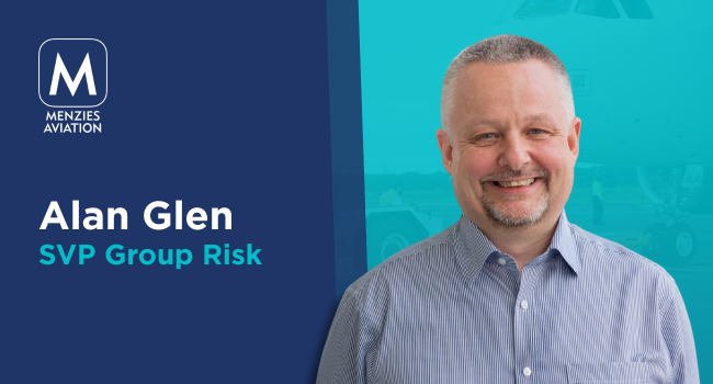 Professional headshot of a smiling Alan Glen, who has short grey hair and is wearing a light blue smart shirt. Alan is pictured against a dark blue and light blue split background. His name and job title are displayed on the image. Professional headshot of a smiling Alan Glen, who has short grey hair and is wearing a light blue smart shirt. Alan is pictured against a dark blue and light blue split background. His name and job title are displayed on the image.