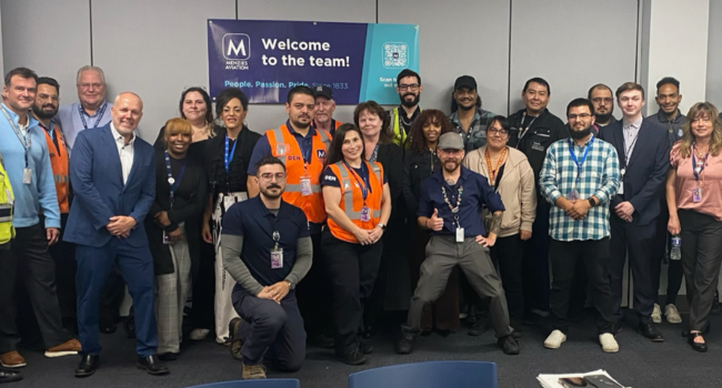 Denver leadership team and colleagues celebrate Menzies and G2 joining forces.