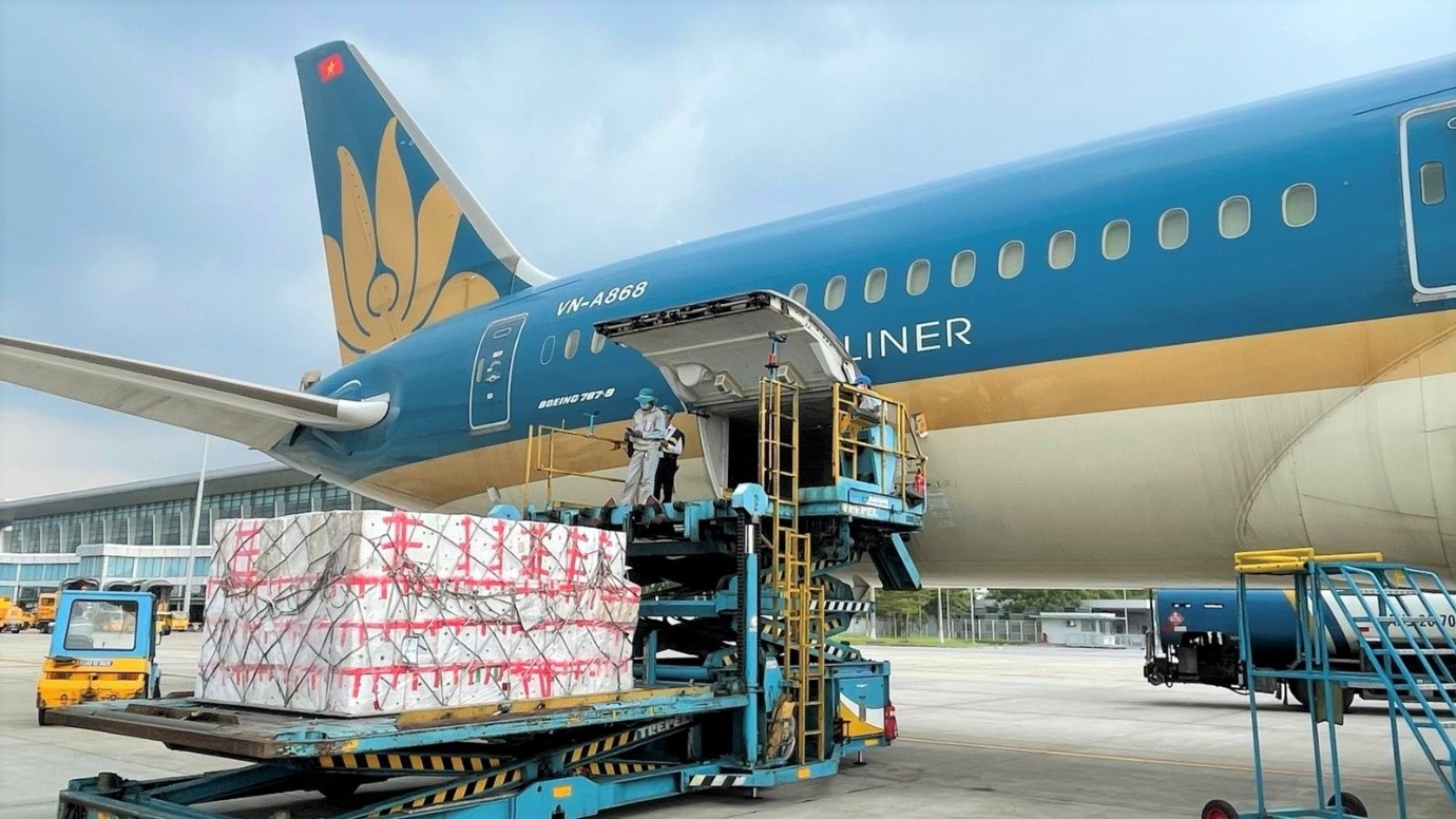 A Vietnam Airlines plane having cargo loaded onto it