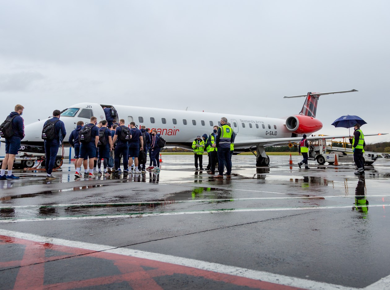 Edinburgh Rugby team boarding Loganair charter at Edinburgh Airport